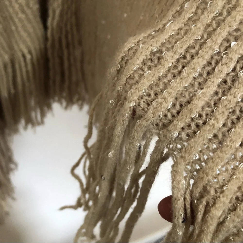 Tan knitted metallic gold fringe hem poncho